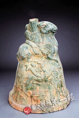 　　▲忠县张家堡3号墓出土摇钱树座