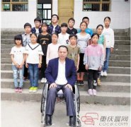 <b>“轮椅教师”余国安：为了学生我会一直坚持</b>
