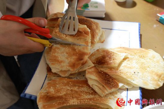 安徽阜阳：一张饼“烤”出生活好味道
